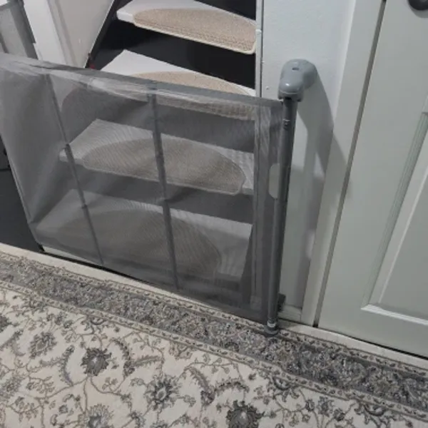 SnugGate retractable mesh gate installed and photographed by a verified buyer in Ireland